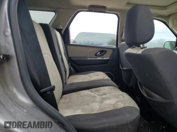 2007 Mercury Mariner Luxury with VIN 4M2YU91107KJ07772, listed as a Copart auction lot 42867545 with 128,235 mi miles and Salvage title. Bid and sale history available at DreamBid. Image 12.