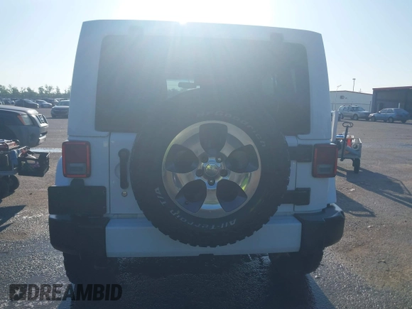 2016 Jeep Wrangler Unlimited 75th Anniversary z VIN 1C4BJWEG1GL250449, wystawiony jako IAAI lot #42204012 z przebiegiem 180 173 mil mil oraz . Historia ofert i sprzedaży dostępna na DreamBid. Obrazek 16.