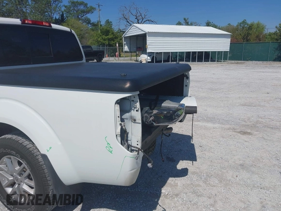 2015 Nissan Frontier SV with VIN 1N6AD0ER0FN746599, listed as a IAAI auction lot 41944073 with 63,347 mi miles and . Bid and sale history available at DreamBid. Image 6.