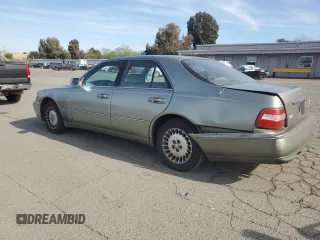 2001 Infiniti Q45 Touring with VIN JNKBY31A01M101364, listed as a Copart auction lot 54859845 with 213,588 mi miles and Salvage Title. Bid and sale history available at DreamBid. Image 2.