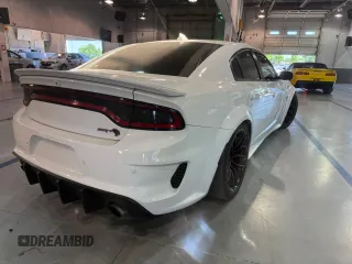 2021 Dodge Charger SRT Hellcat Widebody z VIN 2C3CDXL93MH662407, wystawiony jako Copart lot #58264615 z przebiegiem 56 012 mil mil oraz Czysty tytuł • Clean title. Historia ofert i sprzedaży dostępna na DreamBid. Obrazek 4.