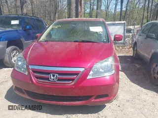 2005 Honda Odyssey EX-L with VIN 5FNRL38755B118345, listed as a IAAI auction lot 41806386 with 247,502 mi miles. Bid and sale history available at carsss.com. Image 13.
