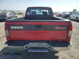 1999 Nissan Frontier XE with VIN 1N6ED26Y1XC302907, listed as a Copart auction lot 51323035 with 218,325 mi miles and Clean title. Bid and sale history available at DreamBid. Image 6.