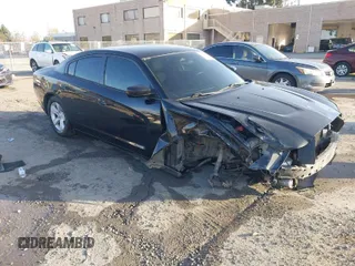2014 Dodge Charger SE with VIN 2C3CDXBGXEH353860, listed as a IAAI auction lot 41819065 with 158,774 mi miles. Bid and sale history available at carsss.com. Image 1.