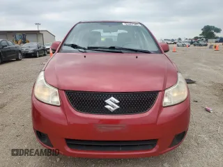 2012 Suzuki SX4 LE z VIN JS2YC5A33C6304897, wystawiony jako Copart lot #55567505 z przebiegiem 42 968 mil mil oraz Szkoda całkowita • Salvage title. Historia ofert i sprzedaży dostępna na DreamBid. Obrazek 5.