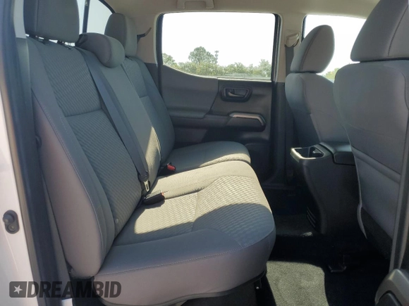 2023 Toyota Tacoma SR5 z VIN 3TMAZ5CN3PM212056, wystawiony jako Copart lot #57217735 z przebiegiem 36 533 mil mil oraz Szkoda całkowita • Salvage title. Historia ofert i sprzedaży dostępna na DreamBid. Obrazek 10.