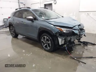 2024 Subaru Crosstrek Premium z VIN JF2GUADC4R8252489, wystawiony jako IAAI lot #41829149 z przebiegiem 11 129 mil mil oraz . Historia ofert i sprzedaży dostępna na DreamBid. Obrazek 1.