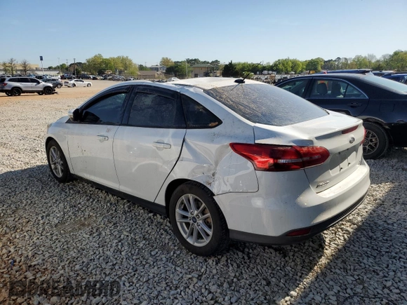 2017 Ford Focus SE with VIN 1FADP3FE8HL292272, listed as a Copart auction lot 52407755 with 127,038 mi miles and Salvage Title. Bid and sale history available at carsss.com. Image 2.