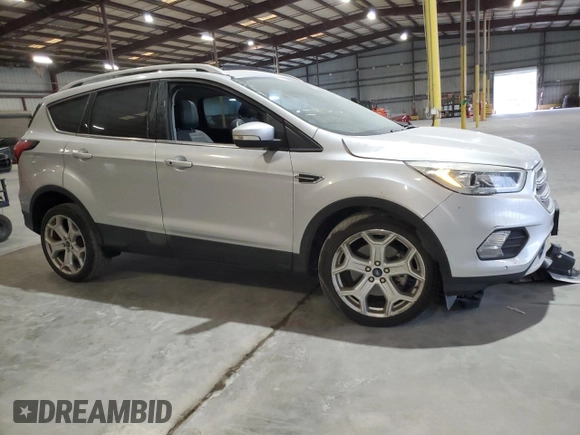 2019 Ford Escape Titanium with VIN 1FMCU0J96KUB77741, listed as a Copart auction lot 57517325 with 90,002 mi miles and Non repairable. Bid and sale history available at DreamBid. Image 4.