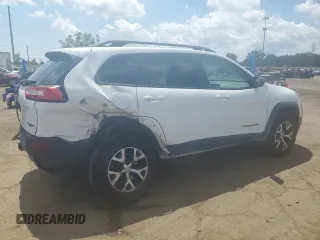 2015 Jeep Cherokee Trailhawk with VIN 1C4PJMBSXFW651000, listed as a Copart auction lot 64110515 with 135,571 mi miles and Clean title. Bid and sale history available at DreamBid. Image 3.
