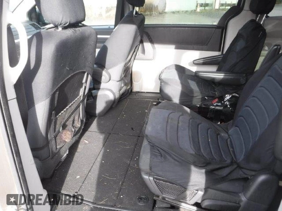 2009 Dodge Grand Caravan SE z VIN 2D8HN44E19R693683, wystawiony jako Copart lot #48208395 z przebiegiem 142 334 mil mil oraz Szkoda całkowita • Salvage title. Historia ofert i sprzedaży dostępna na DreamBid. Obrazek 10.