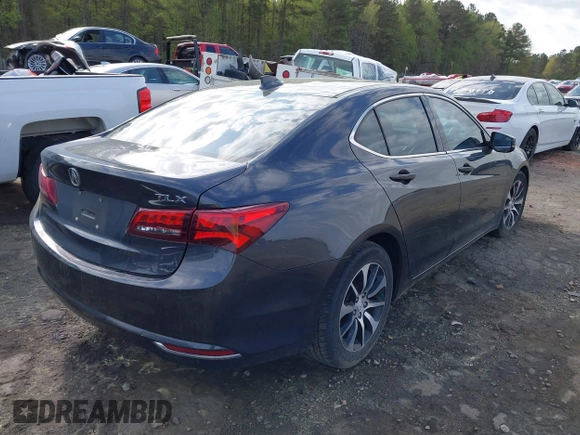 2015 Acura TLX with VIN 19UUB1F34FA024888, listed as a IAAI auction lot 41904887 with 72,112 mi miles. Bid and sale history available at carsss.com. Image 4.