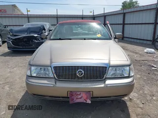 2004 Mercury Grand Marquis LS Premium z VIN 2MEFM75W34X674542, wystawiony jako IAAI lot #42018186 z przebiegiem 137 944 mil mil oraz . Historia ofert i sprzedaży dostępna na DreamBid. Obrazek 13.