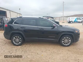 2019 Jeep Cherokee Altitude with VIN 1C4PJLLBXKD280354, listed as a IAAI auction lot 42124578 with 162,289 mi miles and . Bid and sale history available at DreamBid. Image 13.