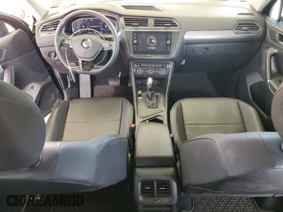 2020 Volkswagen Tiguan SE z VIN 3VV3B7AXXLM138188, wystawiony jako Copart lot #52787085 z przebiegiem 58 363 mil mil oraz Szkody całkowita. Historia ofert i sprzedaży dostępna na DreamBid. Obrazek 8.