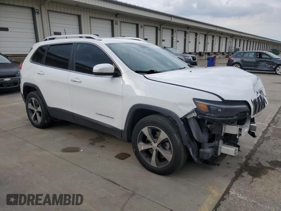 2019 Jeep Cherokee Limited with VIN 1C4PJMDX2KD409798, listed as a Copart auction lot 56913685 with 59,299 mi miles and Salvage title. Bid and sale history available at DreamBid. Image 4.