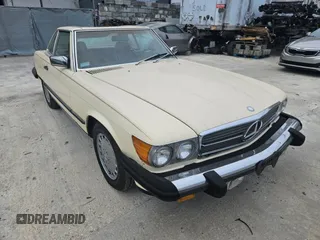 1987 Mercedes-Benz 560 with VIN WDBBA48D5HA061899, listed as a Copart auction lot 76554184 with 68,292 mi miles and Salvage Title. Bid and sale history available at carsss.com. Image 1.