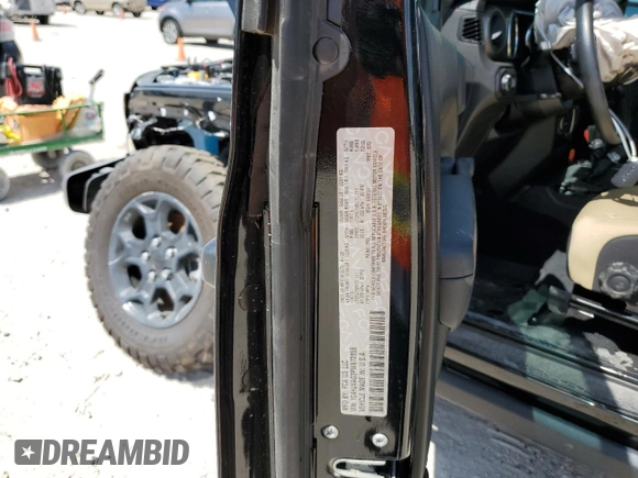 2023 Jeep Wrangler Sport with VIN 1C4HJXAG3PW672856, listed as a Copart auction lot 70444274 with 6,077 mi miles and Salvage title. Bid and sale history available at DreamBid. Image 13.