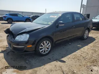 2010 Volkswagen Jetta S with VIN 3VWJX7AJ0AM010023, listed as a Copart auction lot 52379285 with 124,881 mi miles and Salvage title. Bid and sale history available at DreamBid. Image 1.