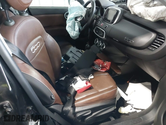 2016 FIAT 500X Trekking Plus z VIN ZFBCFYET4GP343587, wystawiony jako IAAI lot #41439059 z przebiegiem 106 143 mil mil oraz . Historia ofert i sprzedaży dostępna na DreamBid. Obrazek 5.