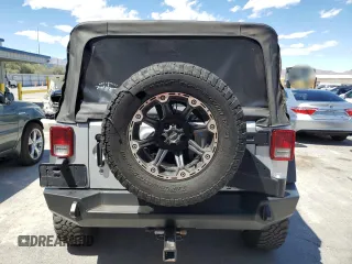 2012 Jeep Wrangler Unlimited Call of Duty MW3 with VIN 1C4BJWFG9CL199551, listed as a Copart auction lot 57097555 with 43,651 mi miles and Salvage title. Bid and sale history available at DreamBid. Image 6.