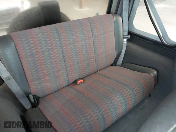 1999 Jeep Wrangler Sport with VIN 1J4FY19S1XP402974, listed as a IAAI auction lot 41659511 with 152,024 mi miles. Bid and sale history available at carsss.com. Image 8.