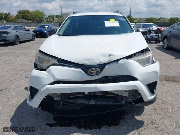 2017 Toyota RAV4 LE with VIN JTMZFREV2HJ711557, listed as a IAAI auction lot 41894094 with 167,645 mi miles. Bid and sale history available at carsss.com. Image 6.