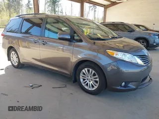 2011 Toyota Sienna XLE AAS with VIN 5TDYK3DC7BS047822, listed as a IAAI auction lot 42073635 with 150,424 mi miles. Bid and sale history available at carsss.com. Image 1.