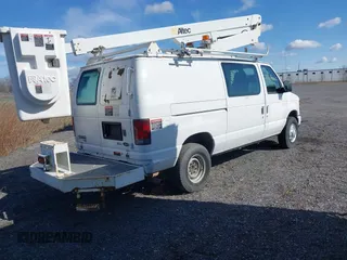 2012 Ford Econoline Cargo Super Duty Commercial with VIN 1FTSE3EL5CDB22042, listed as a IAAI auction lot 41950506 with 157,363 mi miles. Bid and sale history available at carsss.com. Image 4.