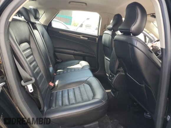 2017 Ford Fusion SE z VIN 3FA6P0H96HR150012, wystawiony jako Copart lot #56789925 z przebiegiem 167 772 mil mil oraz Szkoda całkowita • Salvage title. Historia ofert i sprzedaży dostępna na DreamBid. Obrazek 10.