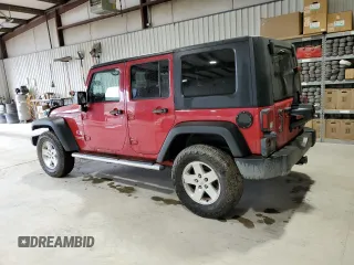 2008 Jeep Wrangler Unlimited X with VIN 1J8GA39128L645762, listed as a Copart auction lot 57888345 with 205,178 mi miles and Salvage title. Bid and sale history available at DreamBid. Image 2.