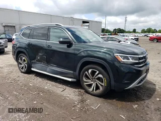 2021 Volkswagen Atlas SEL Premium with VIN 1V2TR2CA8MC516807, listed as a Copart auction lot 56819505 with 65,111 mi miles and Salvage title. Bid and sale history available at DreamBid. Image 4.