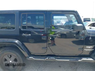 2007 Jeep Wrangler Unlimited Sahara with VIN 1J4GA59187L187656, listed as a IAAI auction lot 42554114 with 200,840 mi miles and . Bid and sale history available at DreamBid. Image 13.