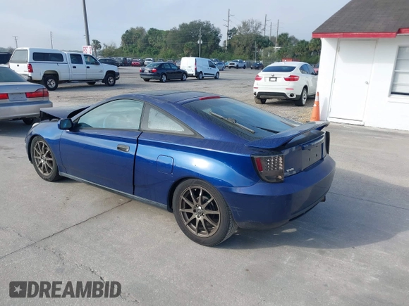 2002 Toyota Celica GT with VIN JTDDR32T220113449, listed as a IAAI auction lot 41546615 with 247,392 mi miles. Bid and sale history available at carsss.com. Image 3.