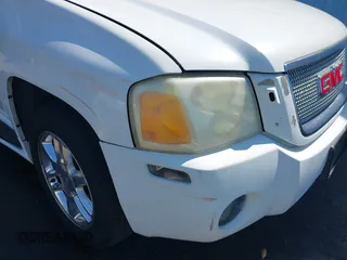 2006 GMC Envoy Denali z VIN 1GKET63M362305394, wystawiony jako IAAI lot #42317806 z przebiegiem 250 565 mil mil oraz . Historia ofert i sprzedaży dostępna na DreamBid. Obrazek 6.