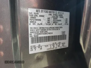 2002 Ford F-150 Harley Davidson with VIN 1FTRW07342KC78218, listed as a Copart auction lot 78273304 with 217,968 mi miles and Salvage Title. Bid and sale history available at carsss.com. Image 12.