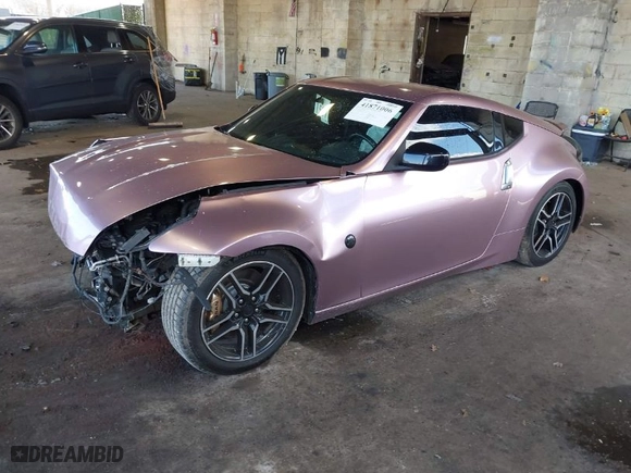 2014 Nissan 370Z with VIN JN1AZ4EH7EM631492, listed as a IAAI auction lot 41871006 with 68,354 mi miles. Bid and sale history available at carsss.com. Image 2.