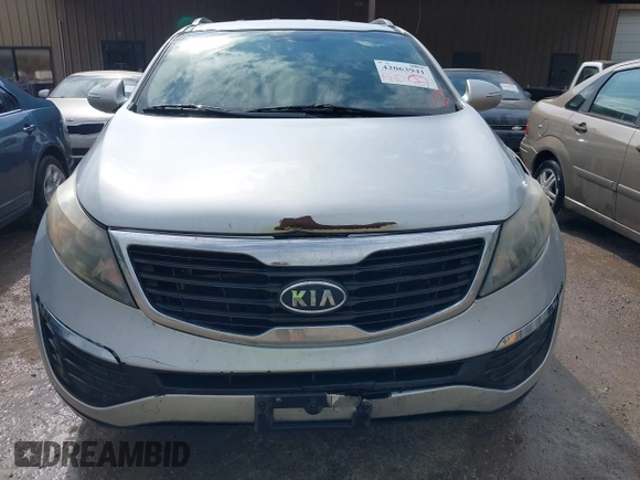 2011 Kia Sportage LX with VIN KNDPB3A23B7053943, listed as a IAAI auction lot 42063941 with 234,364 mi miles and . Bid and sale history available at carsss.com. Image 6.