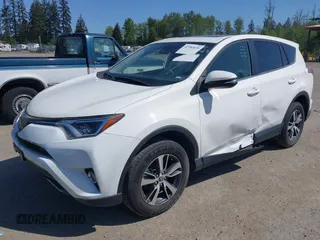 2018 Toyota RAV4 XLE with VIN JTMWFREV3JD130995, listed as a IAAI auction lot 42183630 with 56,624 mi miles. Bid and sale history available at carsss.com. Image 18.