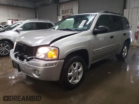 2004 GMC Envoy SLE with VIN 1GKDS13S742369547, listed as a Copart auction lot 51507445 with 119,824 mi miles and Salvage Title. Bid and sale history available at carsss.com. Image 1.