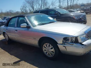 2005 Mercury Grand Marquis LS Premium with VIN 2MEFM75WX5X663507, listed as a IAAI auction lot 42046613 with 85,358 mi miles. Bid and sale history available at carsss.com. Image 13.
