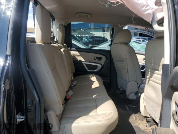 2017 Nissan Titan SV z VIN 1N6AA1E51HN571617, wystawiony jako Copart lot #71640544 z przebiegiem 89 088 mil mil oraz Szkoda całkowita • Salvage title. Historia ofert i sprzedaży dostępna na DreamBid. Obrazek 10.