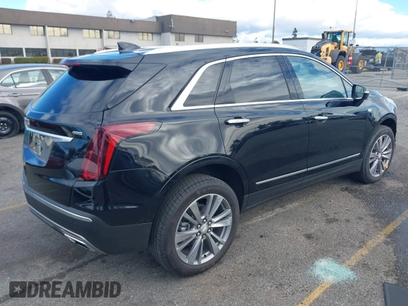 2024 Cadillac XT5 FWD Premium Luxury with VIN 1GYKNCRS6RZ745077, listed as a IAAI auction lot 41247248 with 3,302 mi miles. Bid and sale history available at carsss.com. Image 4.