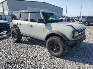 2024 Ford Bronco Wildtrak с VIN 1FMEE2BPXRLB16732, выставлен на аукционе Copart как лот 56394005 с пробегом 8 428 миль миль и Списание • Salvage title. История ставок и продаж доступна на DreamBid. Изображение 4.