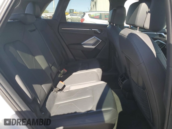 2020 Audi Q3 Premium with VIN WA1AECF30L1023652, listed as a Copart auction lot 57148915 with 69,621 mi miles and Salvage title. Bid and sale history available at DreamBid. Image 10.