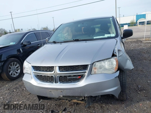 2015 Dodge Grand Caravan SE with VIN 2C4RDGBG8FR612296, listed as a IAAI auction lot 42112920 with 137,023 mi miles and . Bid and sale history available at DreamBid. Image 12.