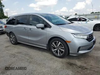 2021 Honda Odyssey Touring z VIN 5FNRL6H85MB039444, wystawiony jako Copart lot #57142205 z przebiegiem 74 228 mil mil oraz Szkoda całkowita • Salvage title. Historia ofert i sprzedaży dostępna na DreamBid. Obrazek 4.