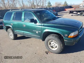 1999 Dodge Durango z VIN 1B4HS28Y9XF658892, wystawiony jako IAAI lot #41022590 z przebiegiem 294 556 mil mil oraz . Historia ofert i sprzedaży dostępna na DreamBid. Obrazek 1.