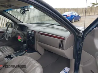 2000 Jeep Grand Cherokee Limited with VIN 1J4GW58N1YC395806, listed as a IAAI auction lot 42267747 with 180,120 mi miles and . Bid and sale history available at DreamBid. Image 5.