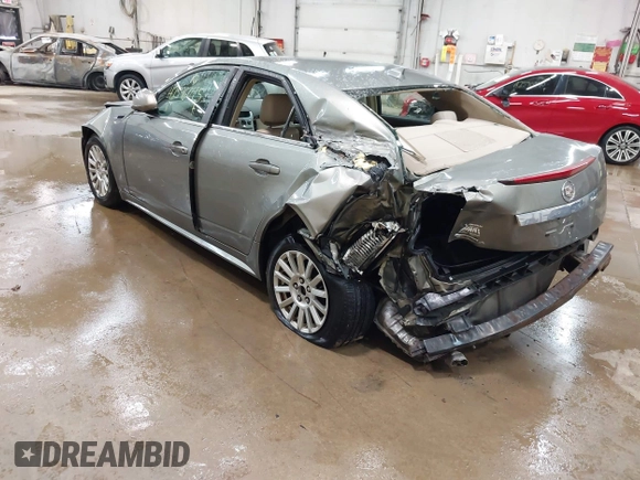 2011 Cadillac CTS Luxury with VIN 1G6DG5EY9B0135220, listed as a IAAI auction lot 42596045 with 158,912 mi miles and . Bid and sale history available at DreamBid. Image 3.